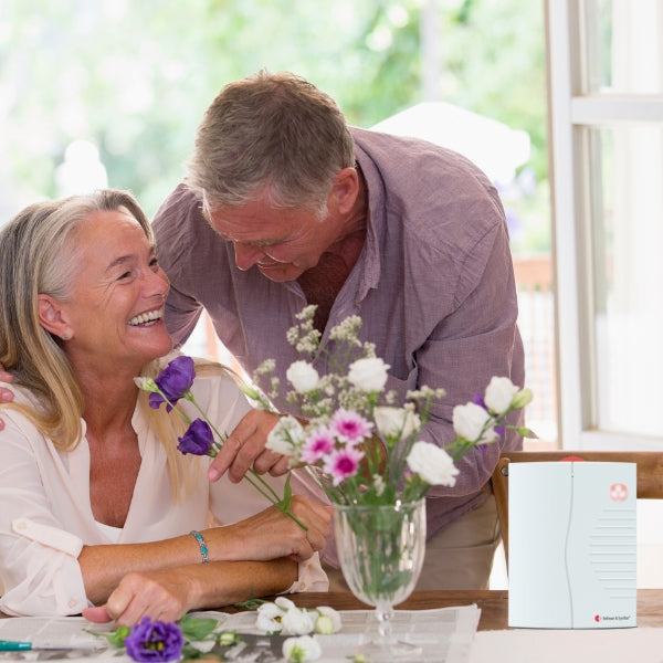 Portable Receiver Displayed with Couple with Hearing Issues