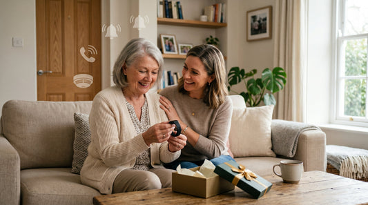 Senior woman holding a medical alert smartwatch gift from her daughter, with icons for safety alerts and calls.