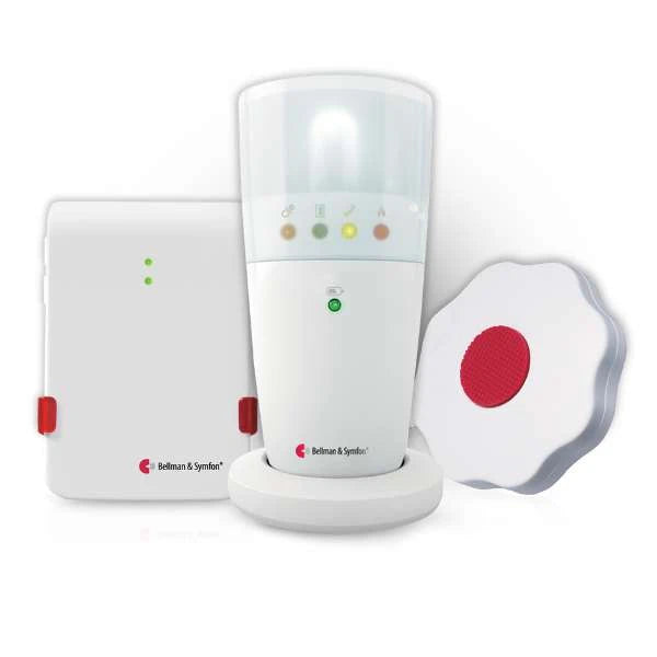 A set of three white Bellman & Symfon smart home alert devices: a rectangular pager receiver, a cylindrical flash receiver with a clear top showing colored LED indicators, and a flower-shaped push-button transmitter with a large red center